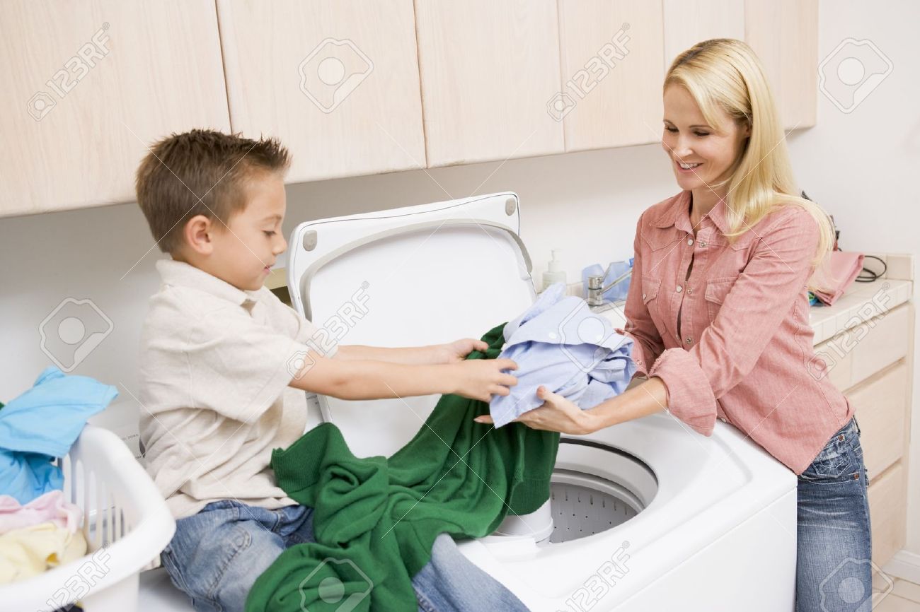 4444955-Mother-And-Son-Doing-Laundry--Stock-Photo-laundry-machine-washing